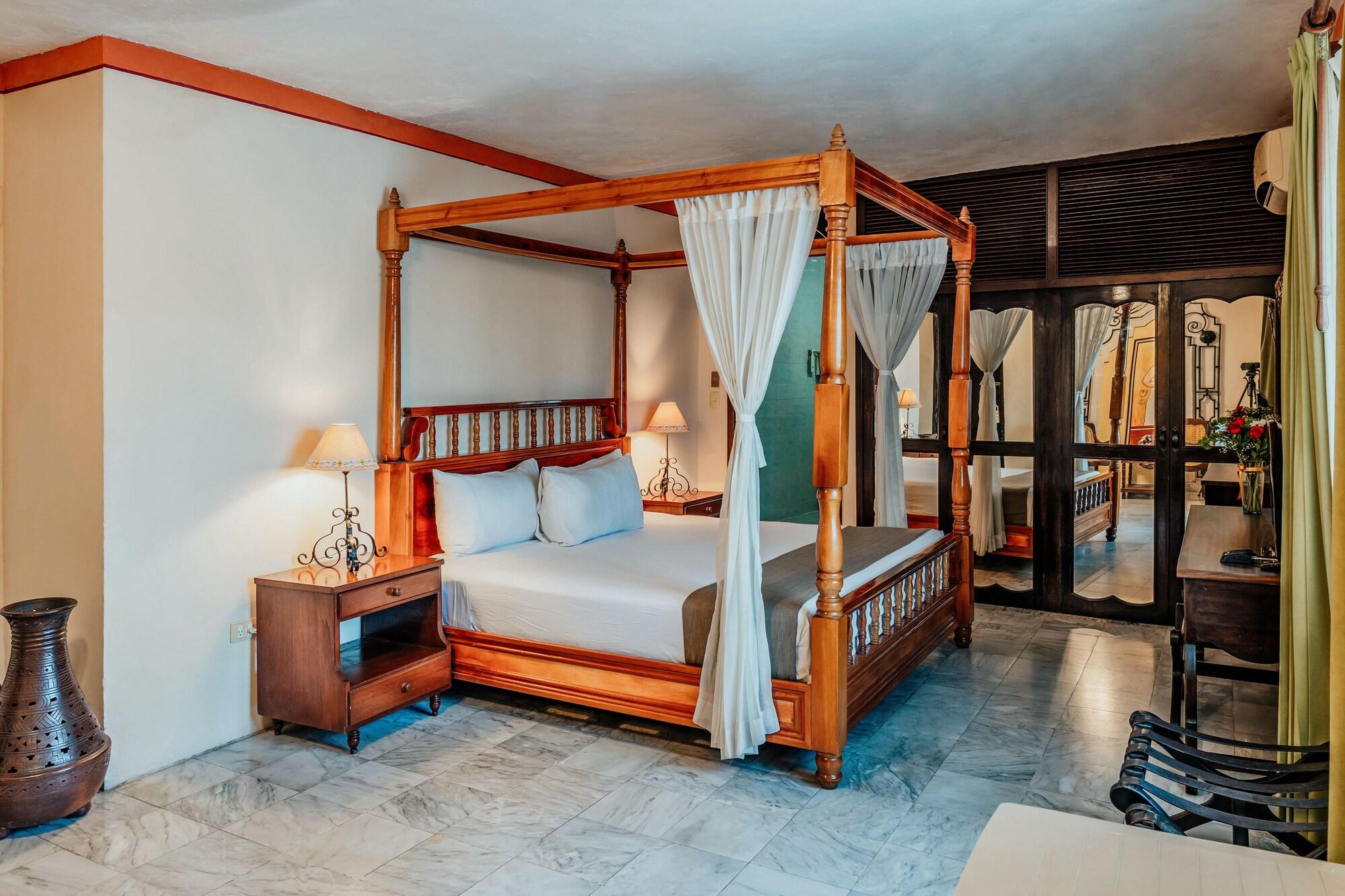 Hotel Casa del Balam Mérida Exterior foto A bedroom at the hotel