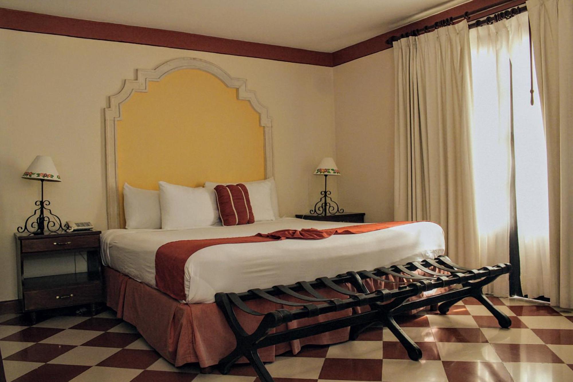 Hotel Casa del Balam Mérida Exterior foto A bedroom at the hotel