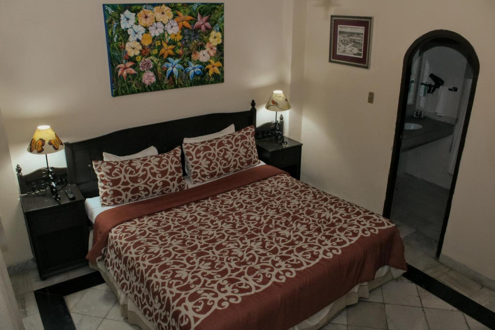 Hotel Casa del Balam Mérida Exterior foto A bedroom